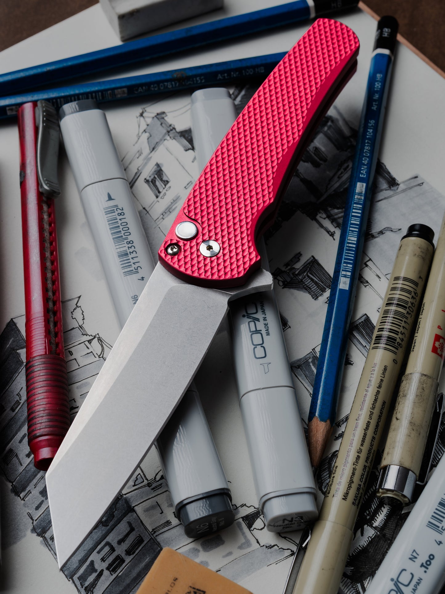 Pro-Tech Malibu 5405 LTD-Red – MagnaCut Reverse Tanto, Textured Red Handle, Gold Lip Pearl Button