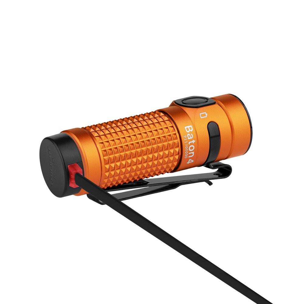Olight Baton 4 Orange with MCC magnetic charging cable attached to the tailcap