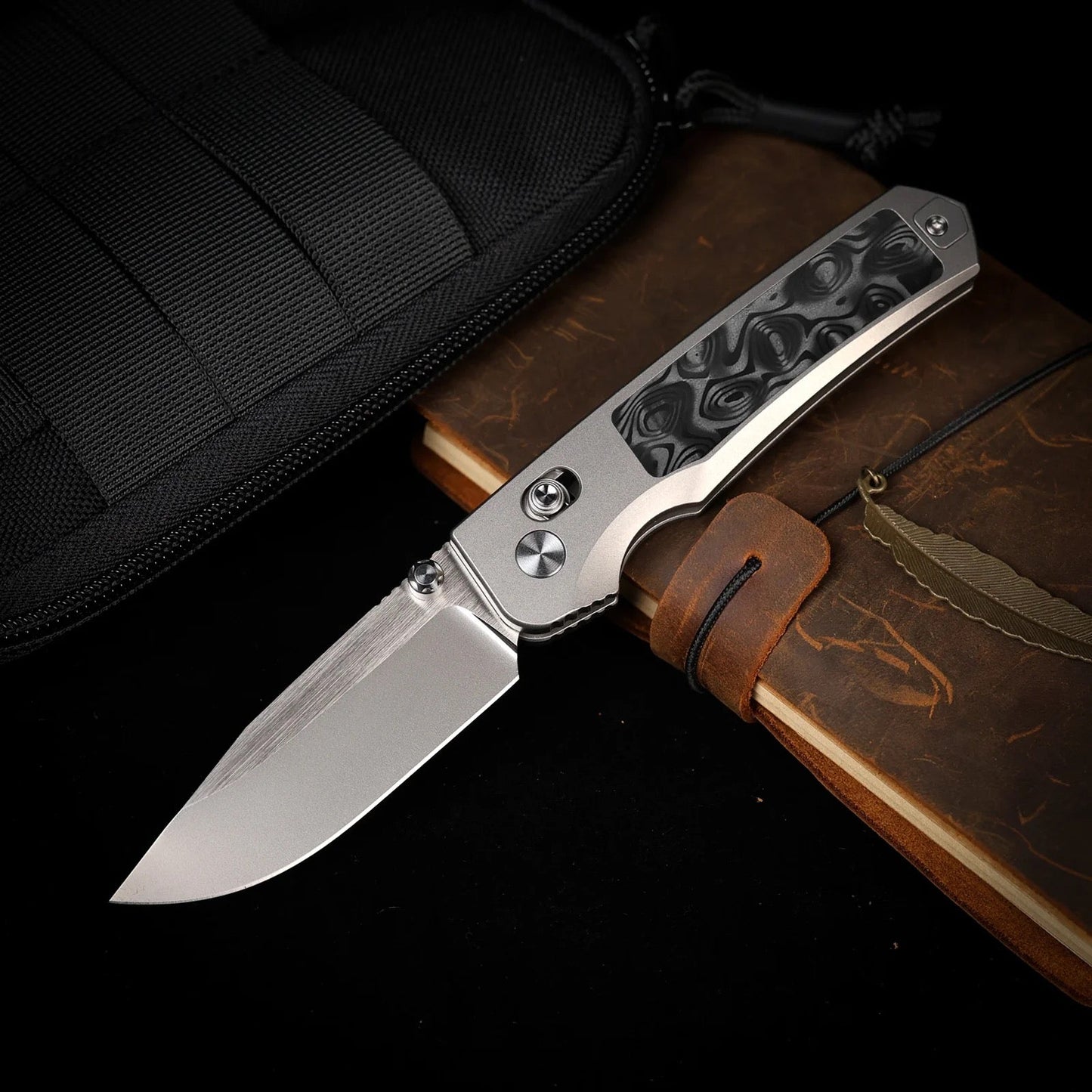 Remette Aurora AURA-D 2.75" M390 Hollow Grind Folding Knife Titanium Raindrop Carbon Fiber Handle Crossbar Lock