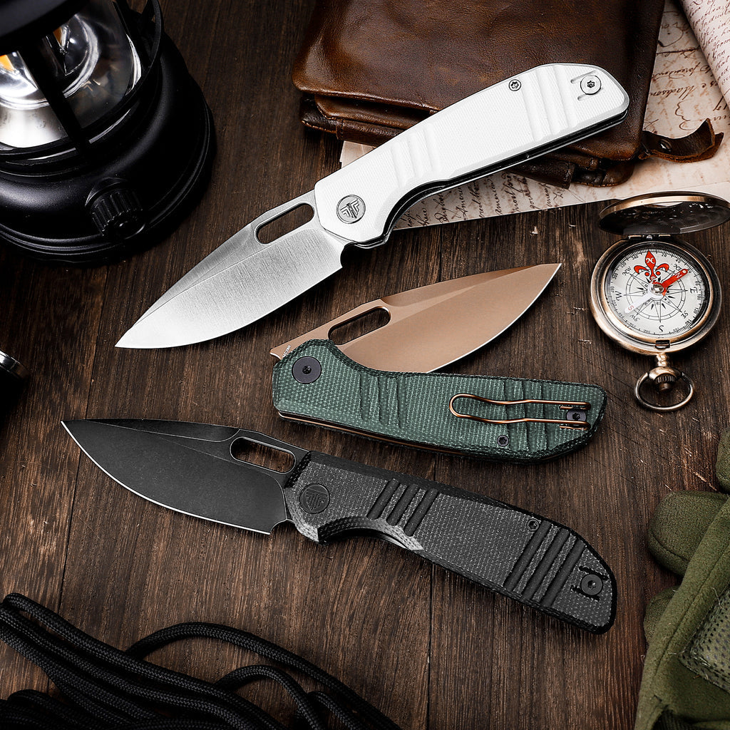 TRIVISA Gecko-WG JM04-WG-14 alongside black and green Gecko variants on a wooden surface