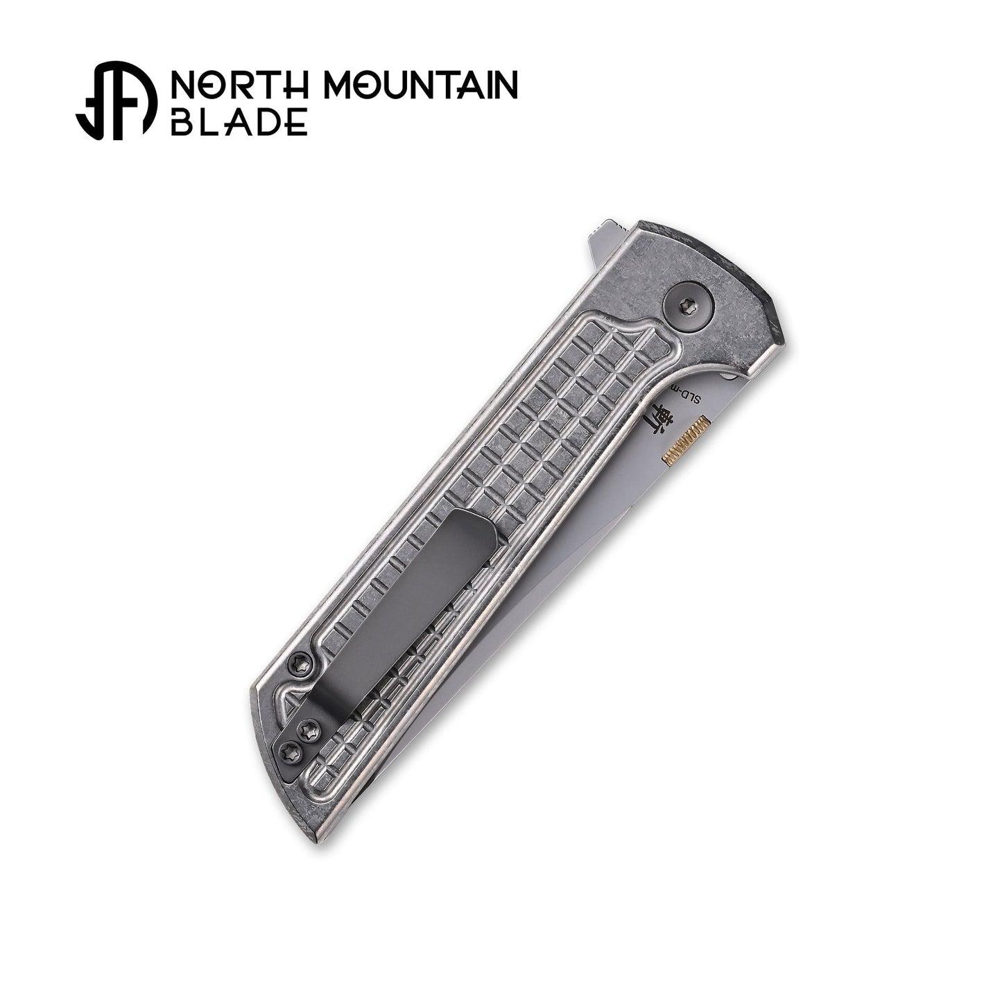North Mountain Blade CHOP2 2406-ICE-G-SL blade detail - 3.5" SLD-Magic laminated tanto