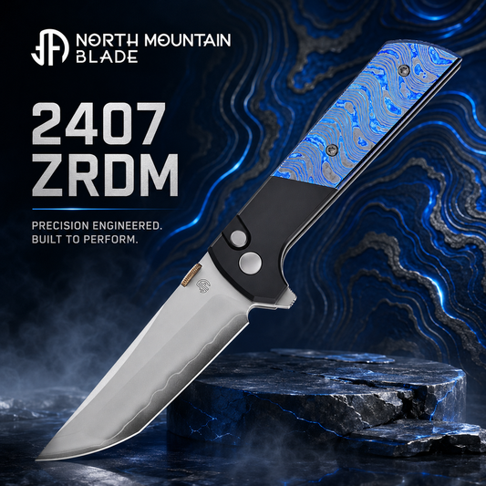 North Mountain Blade 2407-ZRDM front view – 3.5" SLD-Magic tanto folding knife with zirconium & titanium damascus inlays