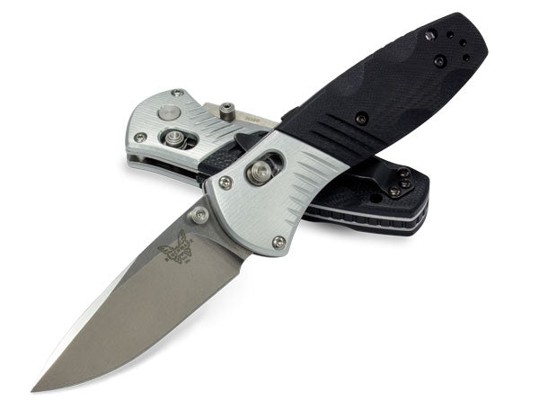 Benchmade Mini Barrage 586 showing M390 drop point blade and black G10 handle