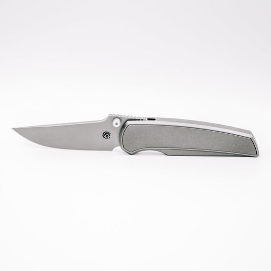 Chaves Knives x Jake McCoy Disciple Street Stonewash front view – 3.60" Stonewash M390 drop point titanium integral folding knife