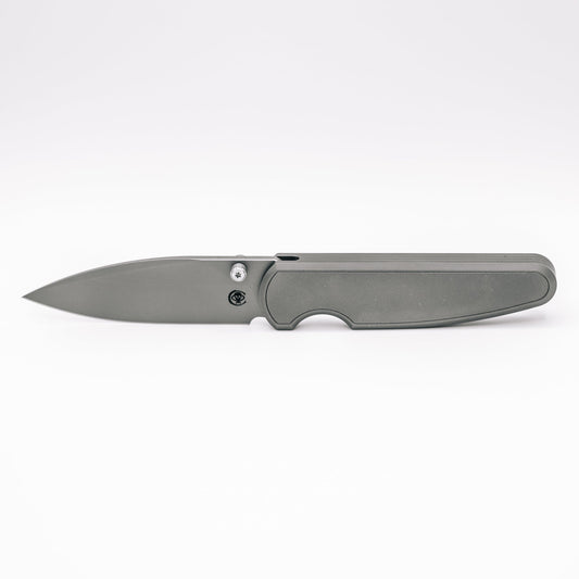 Chaves Knives x Brad Blount Phase 229 Stonewash front view – 3.75" Stonewash M390 drop point titanium integral folding knife