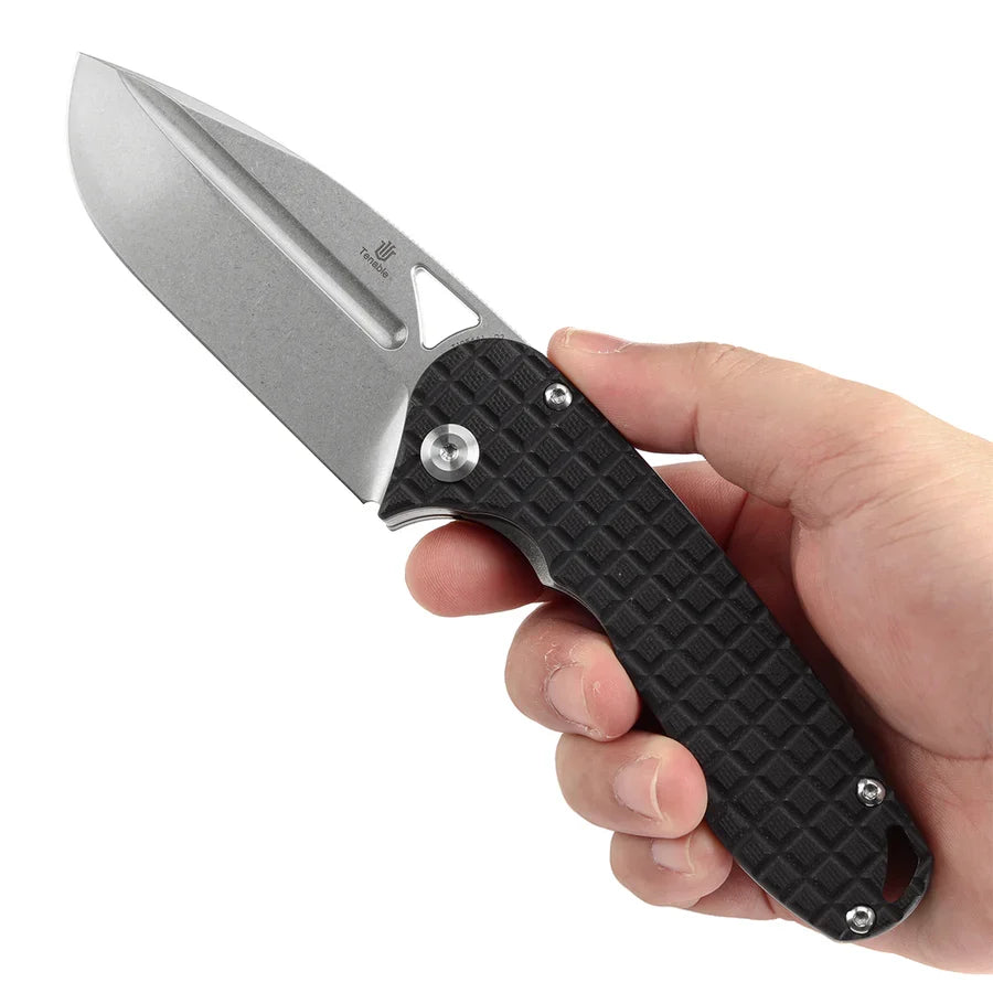Tenable Bömbur T1054A1 in hand – 8.18" overall EDC folding knife grip