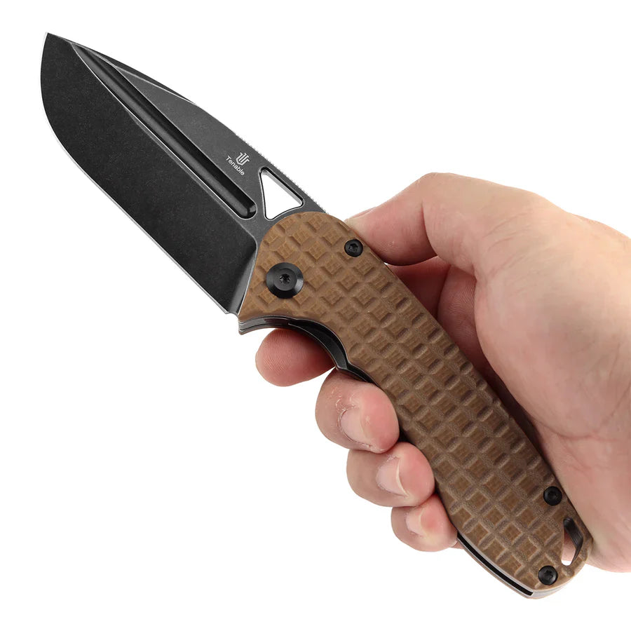 Tenable Bömbur T1054A2 blackwash finish detail on D2 tool steel drop point blade