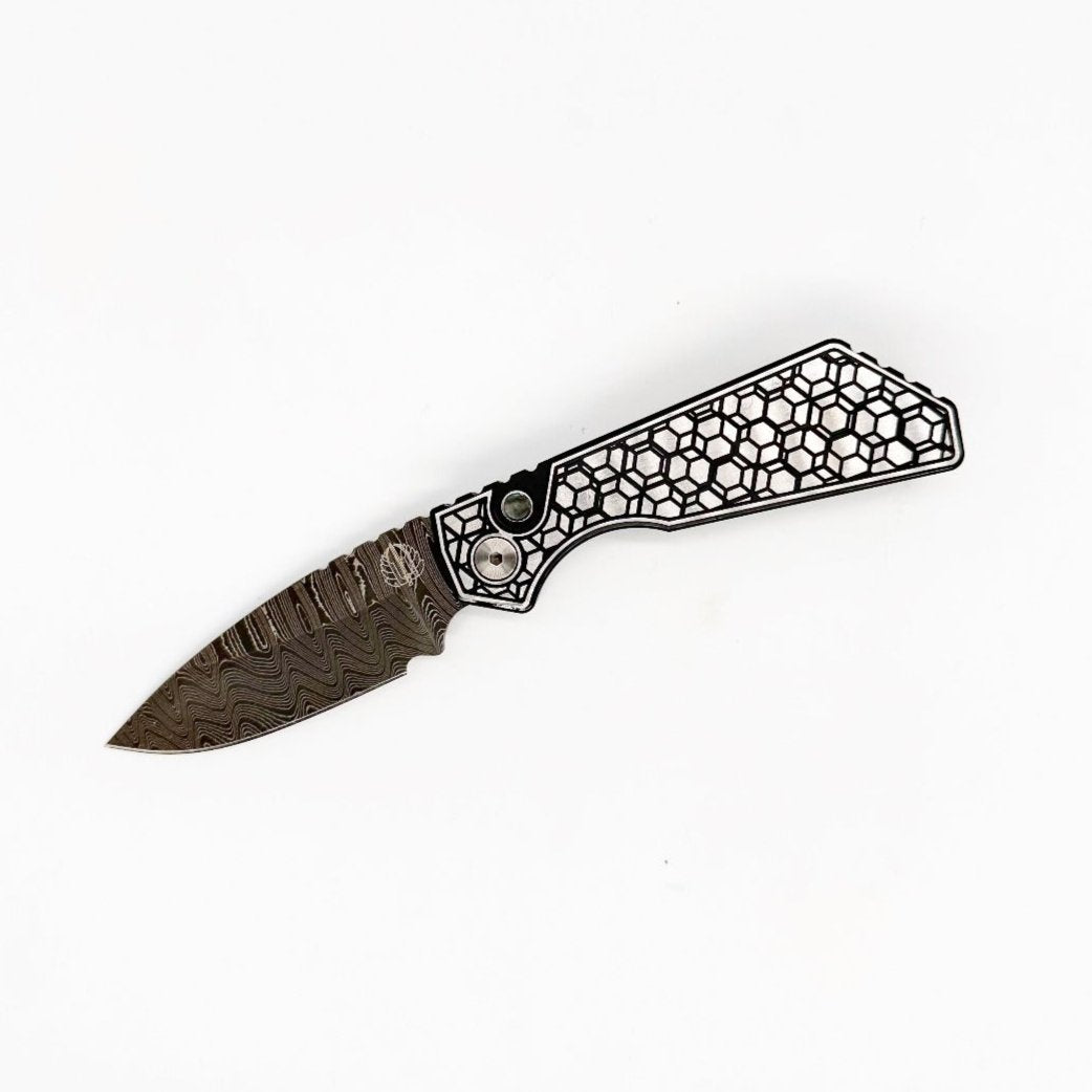 Pro-Tech 2024 Strider PT+ Custom 001 3in Chad Nichols Damascus Blade Two Toned 17-4 Stainless Steel Gridlock Pattern Handles