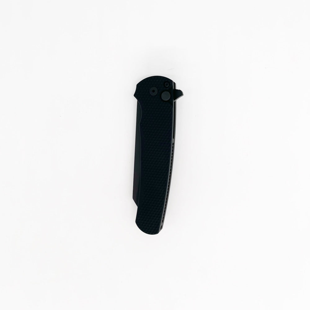 Pro-Tech Malibu Button Lock Folding Knife. Reverse Tanto DLC Black 20cv Steel Blade w/ textured aluminum handles. GoingGear.com