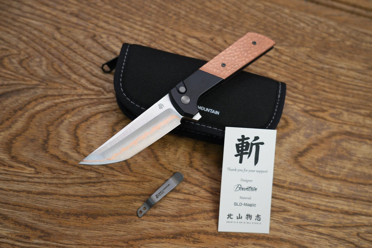 North Mountain Blade Chop 2 2407-CUHM-5 detail view 6 – button lock and flipper deployment
