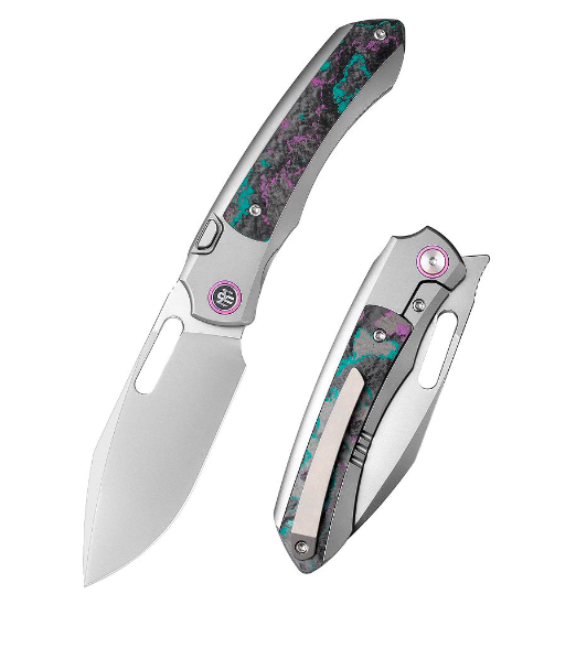 Remette RT-Orca ORCAJY – 3.15″ Pearlescent M390 Drop Point, Titanium & Jazzy CamoCarbon, Button Frame Lock