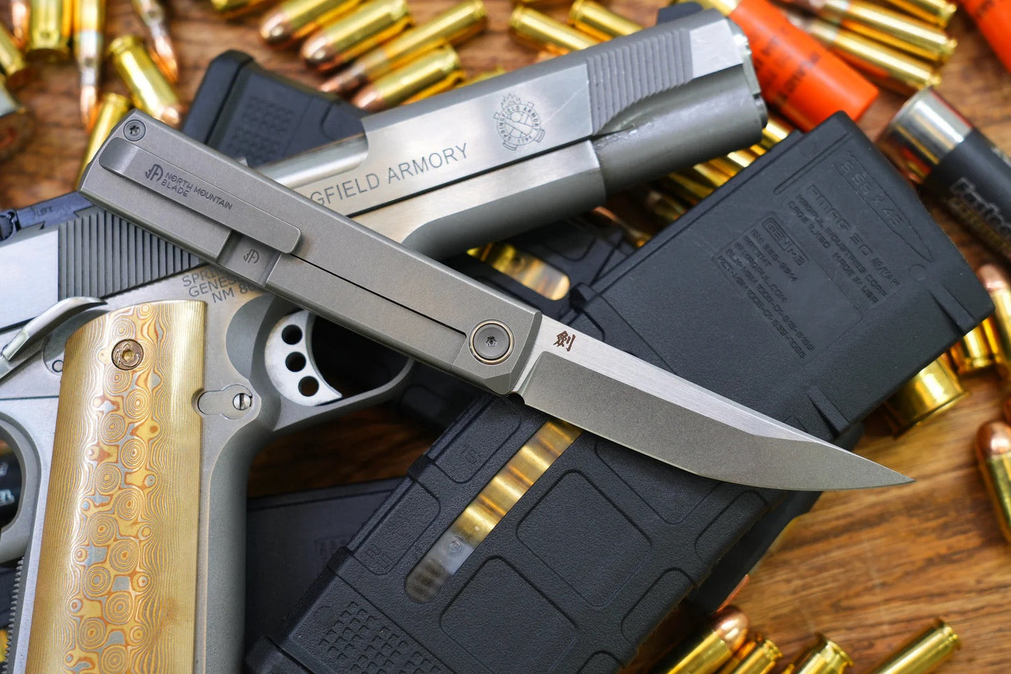 North Mountain Blade Kaiken-Ti-Flat folding knife detail view image 3