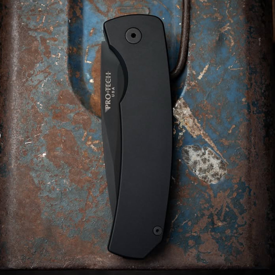 Pro-Tech Magic 2 M2603 open position showing black 154CM plain edge blade