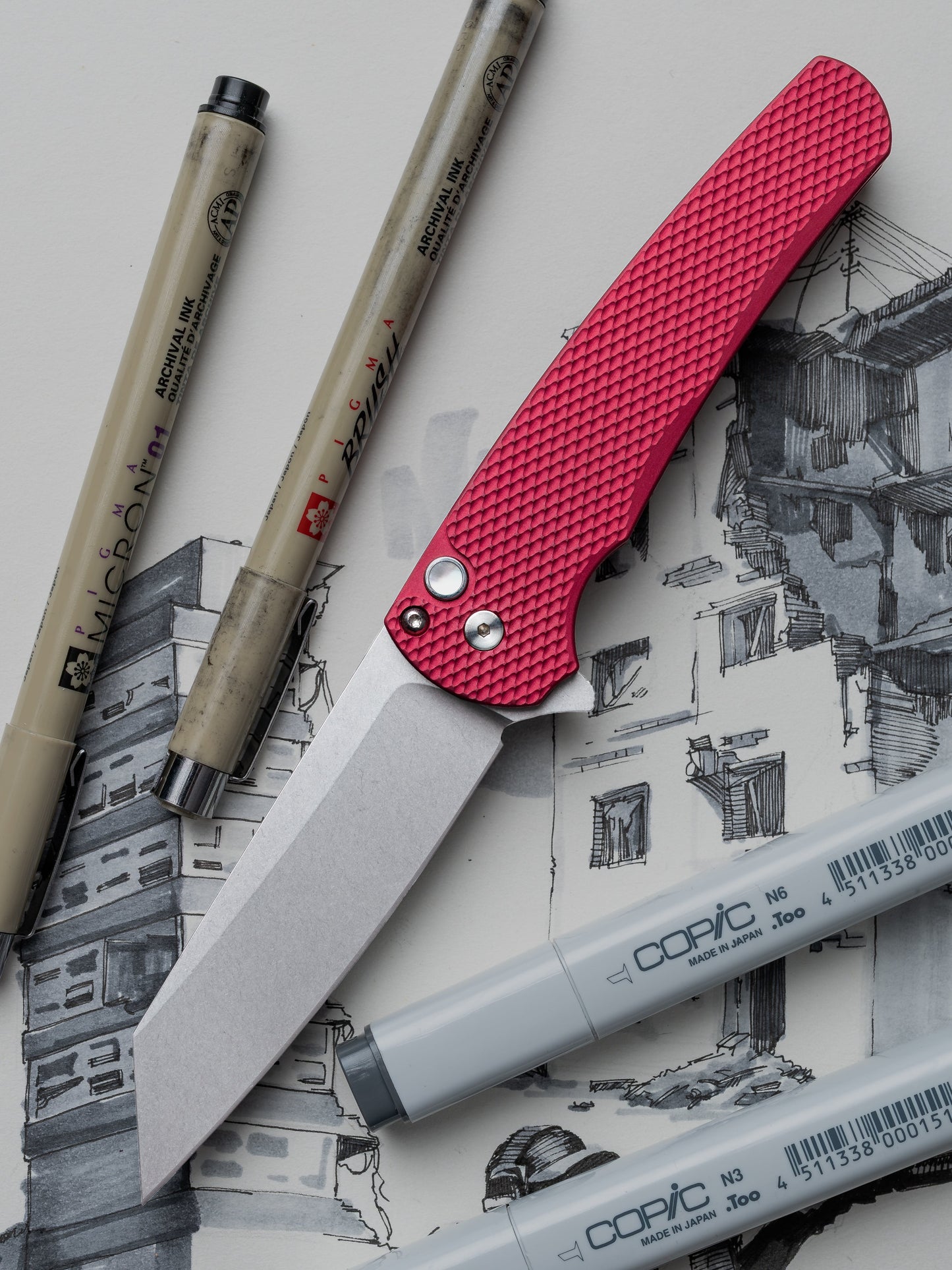 Pro-Tech Malibu 5405 LTD-Red – MagnaCut Reverse Tanto, Textured Red Handle, Gold Lip Pearl Button
