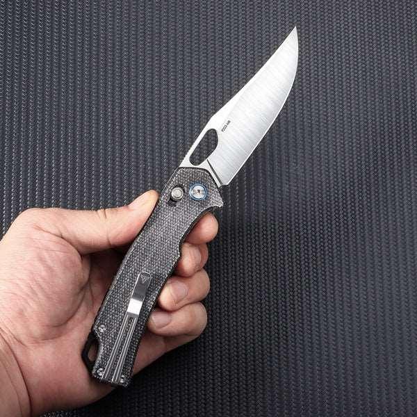 SRM Retriever 9203-MB open position showing 10Cr15CoMoV clip point blade