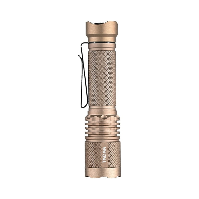 Desert-colored tactical flashlight with textured grip and clip