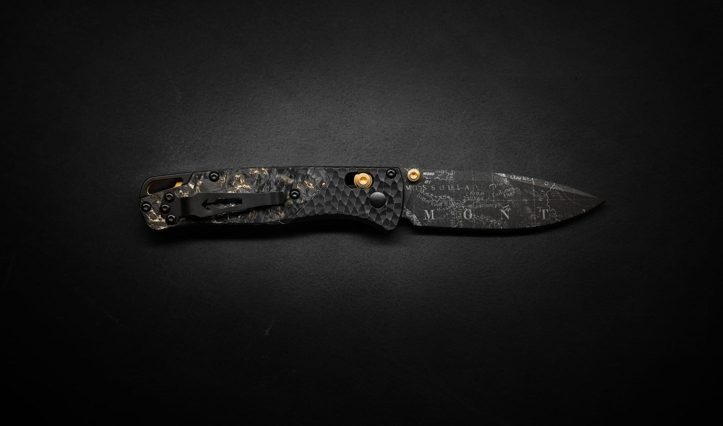 Benchmade Bugout Gold Class 535BK-251 – 3.24″ M390 Black Cerakote Drop Point Folding Knife, Fat Carbon & Titanium, AXIS Lock
