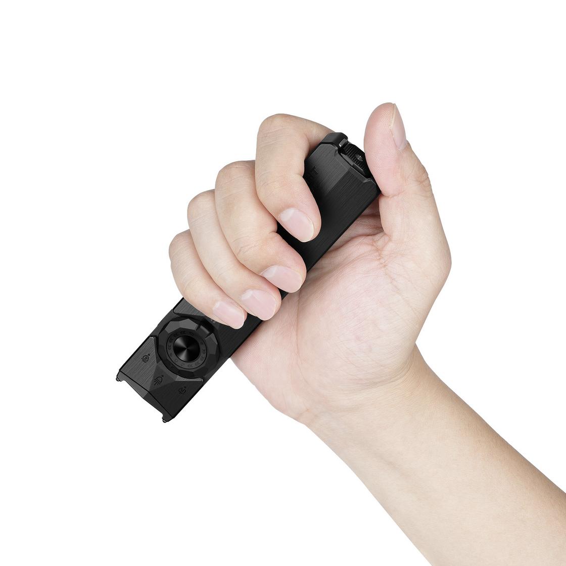 Olight ArkTac Ultra Black held in hand