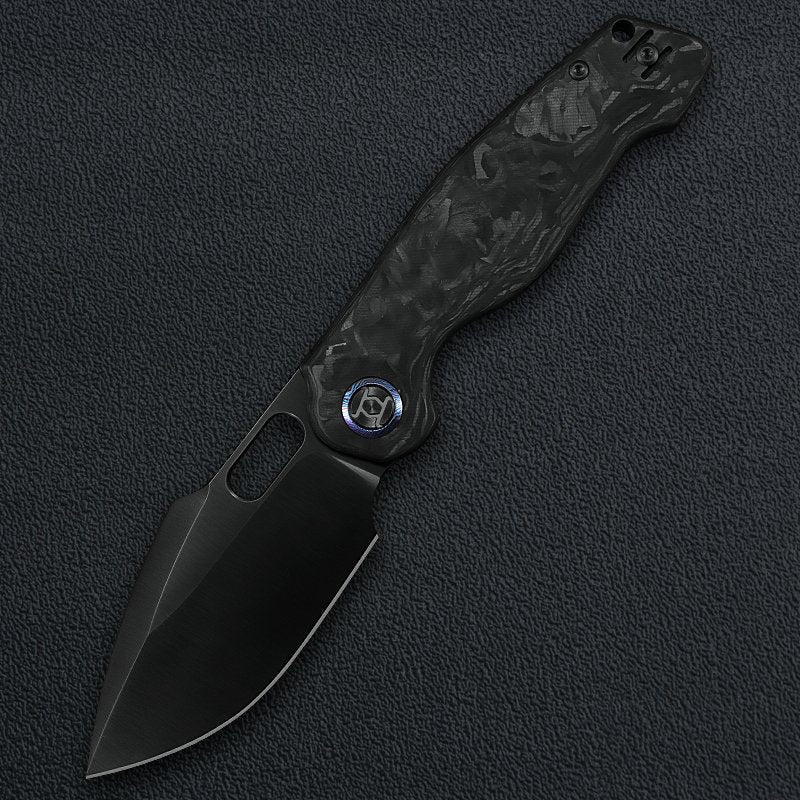 Kunwu Gringo B712-CF-4 front view – 3.62″ DLC ELMAX blade, black carbon fiber handle, Verta Lock folding knife