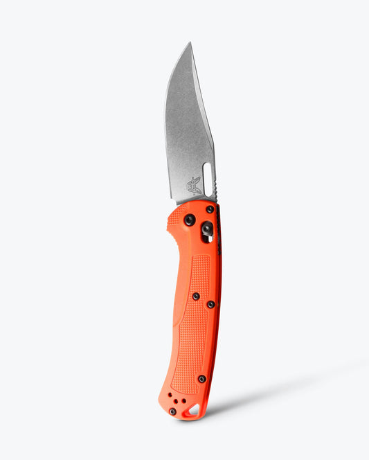 Benchmade Taggedout 15535 front view – 3.5″ CPM-154 clip point folding hunting knife, orange Grivory
