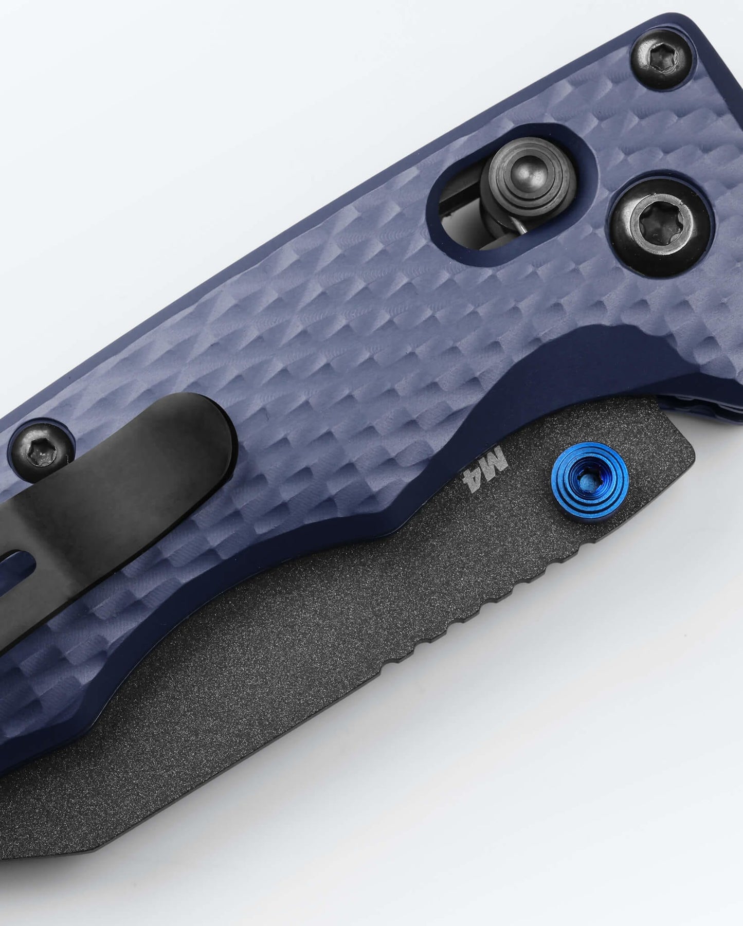 Benchmade Full Immunity 290BK pocket clip and pivot hardware detail on Crater Blue billet aluminum handle