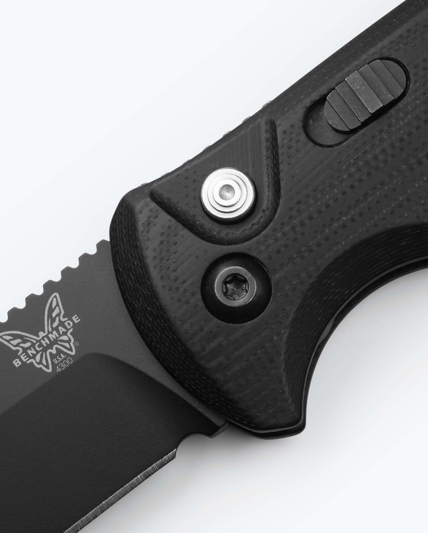 Benchmade CLA 4300 black G10 handle and actuation button detail