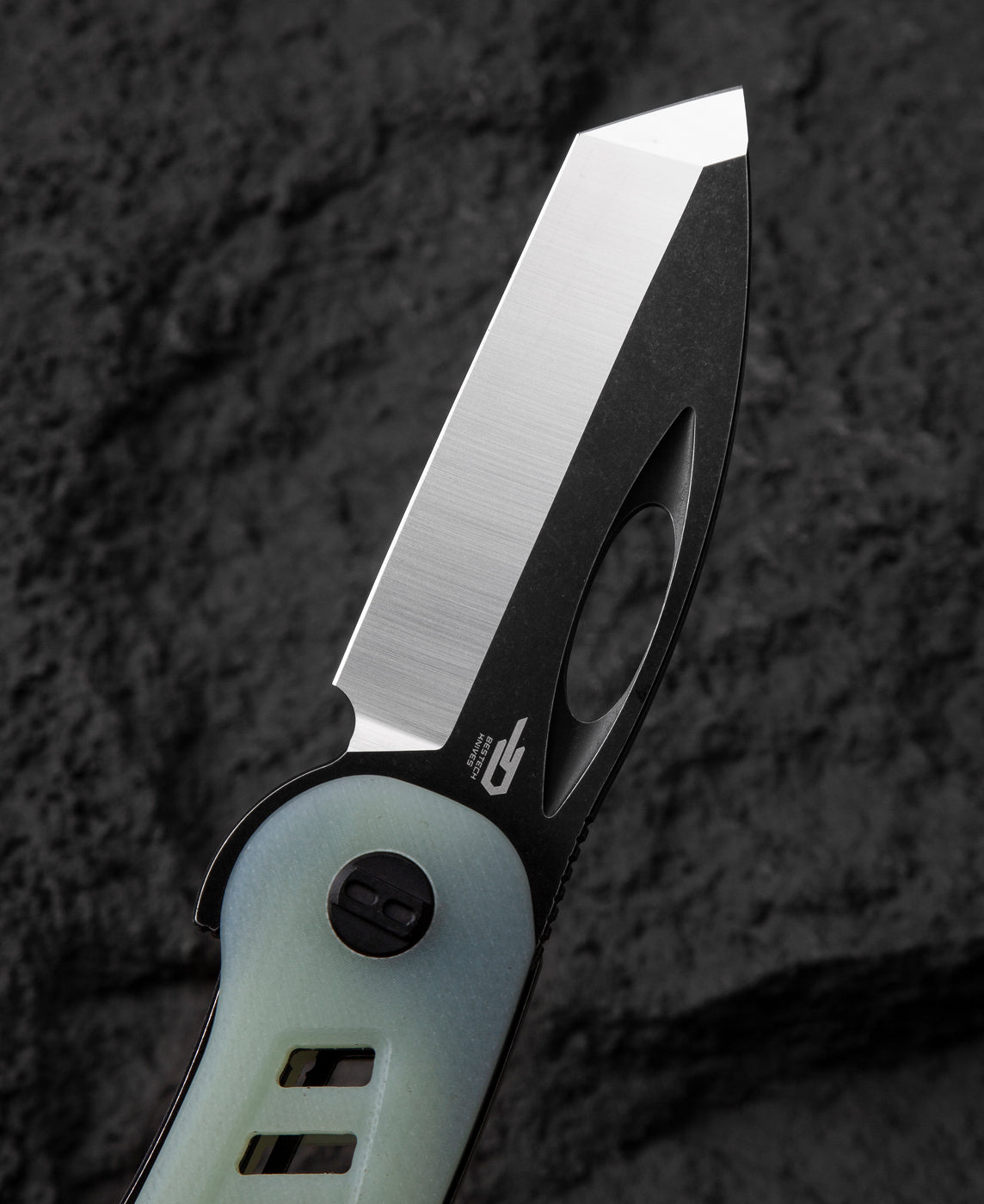 Bestech EXPLORER BG37C handle detail – transparent G10 scales revealing liner lock mechanism