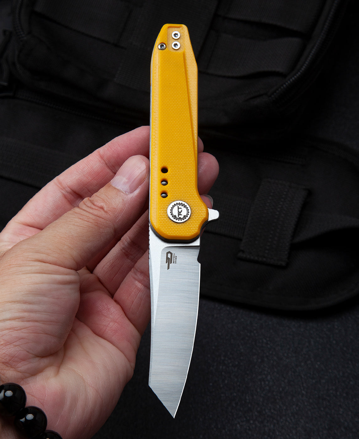 Bestech SYNTAX BG40B closed carry – yellow G10 handle, compact pocket folding knife