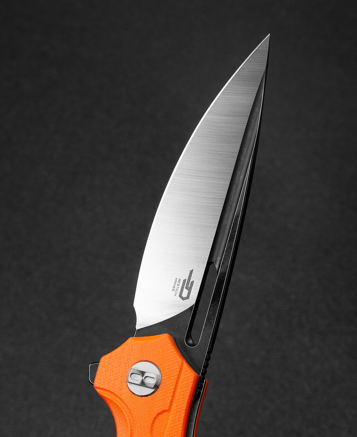 Bestech ORNETTA BG50C handle detail – orange G10 texture and ergonomic contouring