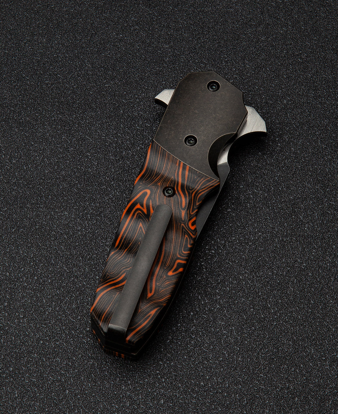 Bestech Freefall BT2007B side view – black titanium frame with orange G10 scales