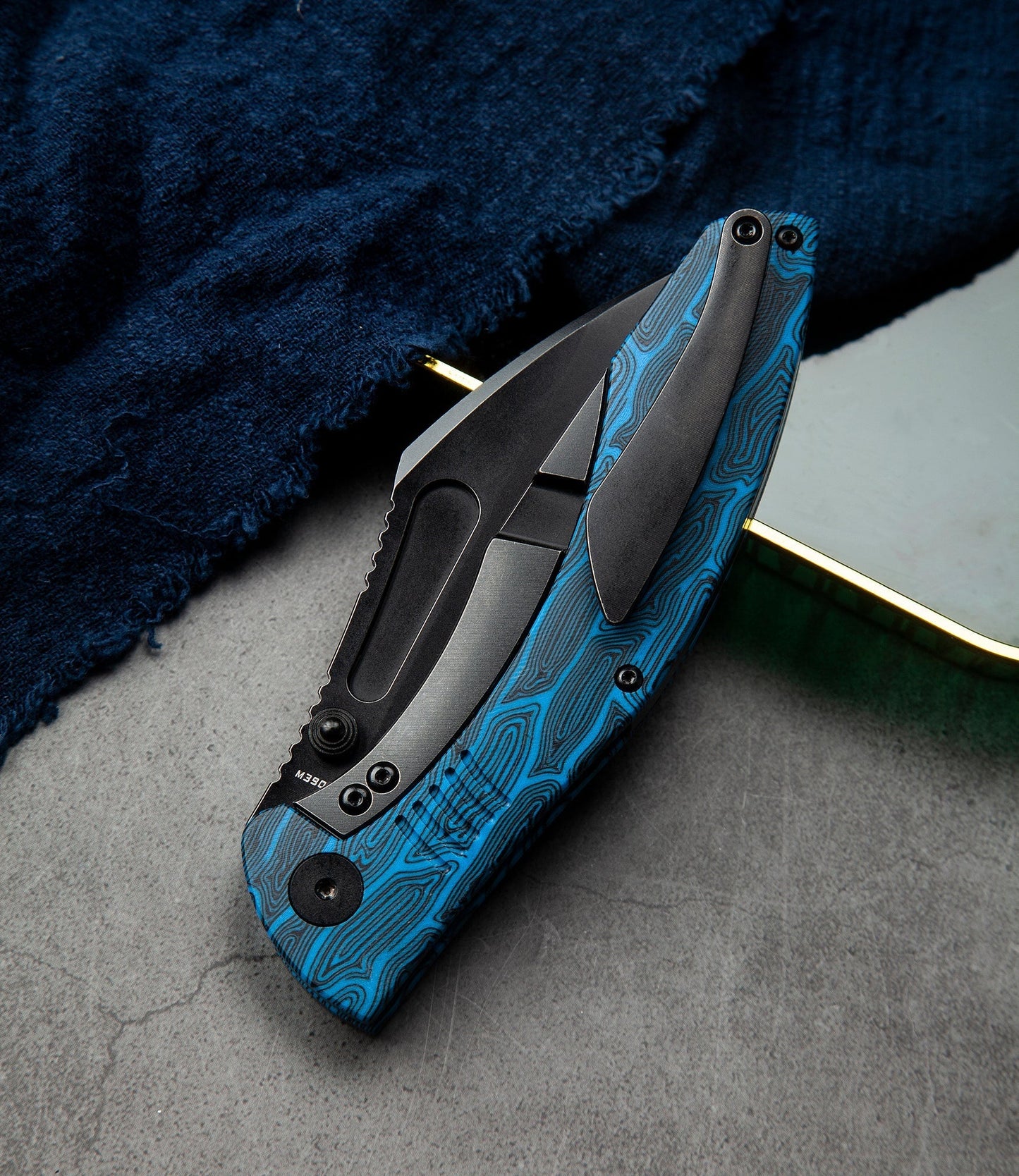 Bestech Lockness BT2205D blue G10 detail – blue and black G10 handle scales showing aggressive grip texture