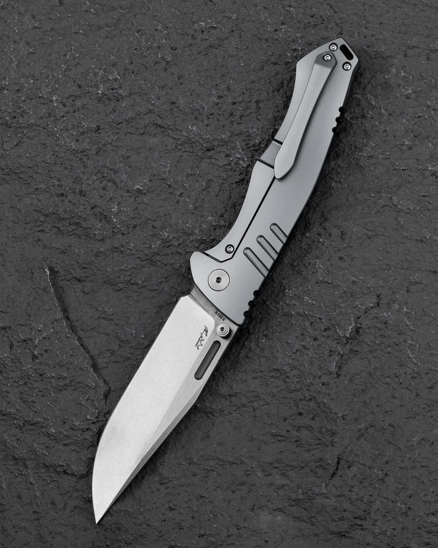 Bestech Keen II BT2301B side view – black titanium handle with marble carbon fiber scales and ceramic bearings