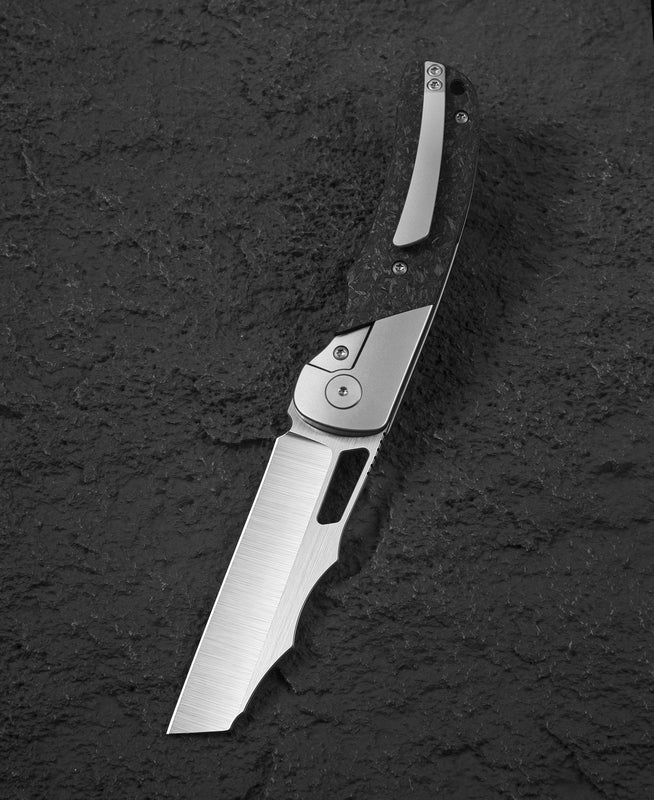 Bestech Syn BT2306A closed view – bead blast titanium frame lock, marble carbon fiber inlay