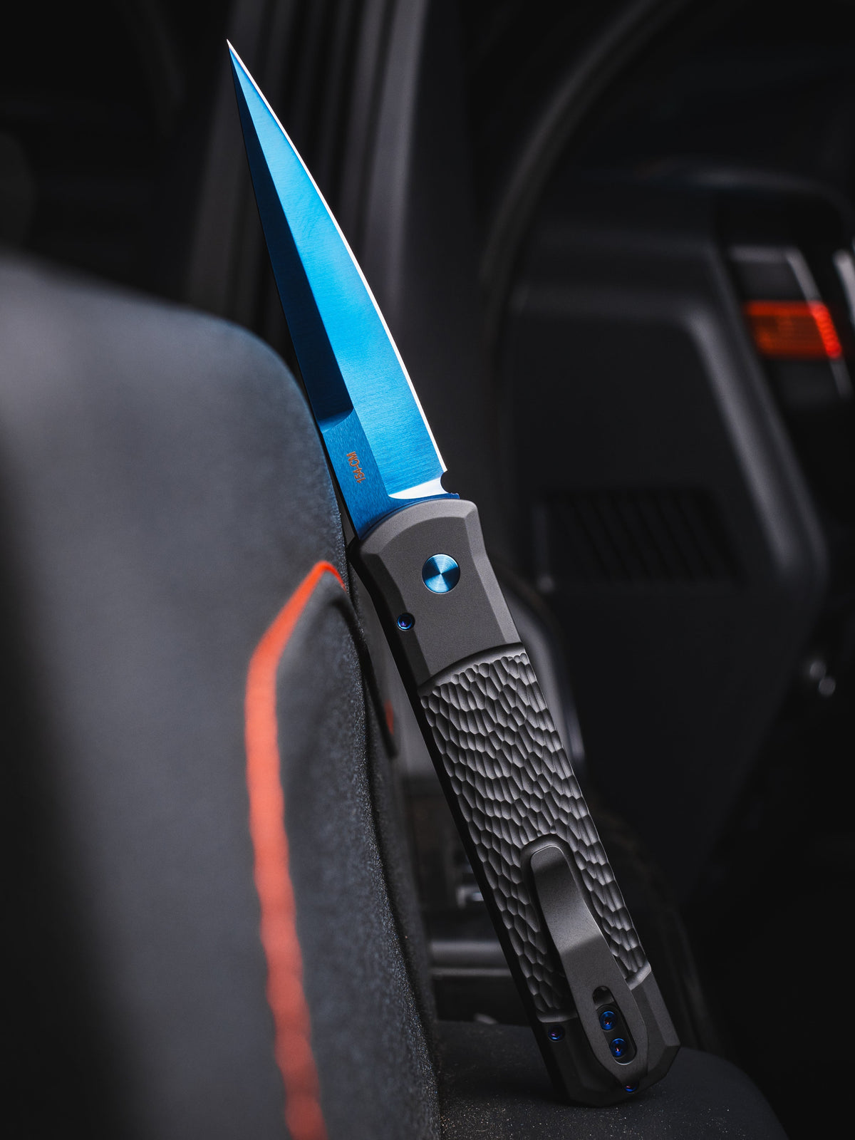 Pro-Tech Godfather CCKSF26.Godfather.1 open position showing sapphire blue 154CM stiletto blade and jigged black handle