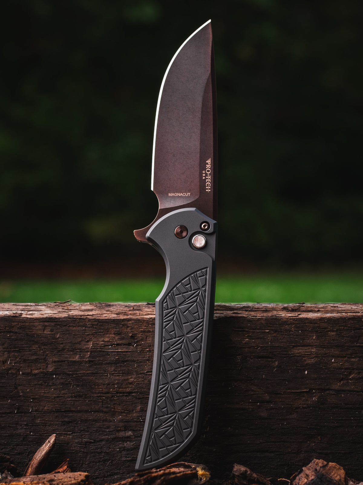 Pro-Tech Mordax CCKSF26.Mordax.1 front view – 3.5" antique PVD MagnaCut drop point button lock flipper, NEXUS textured black handle