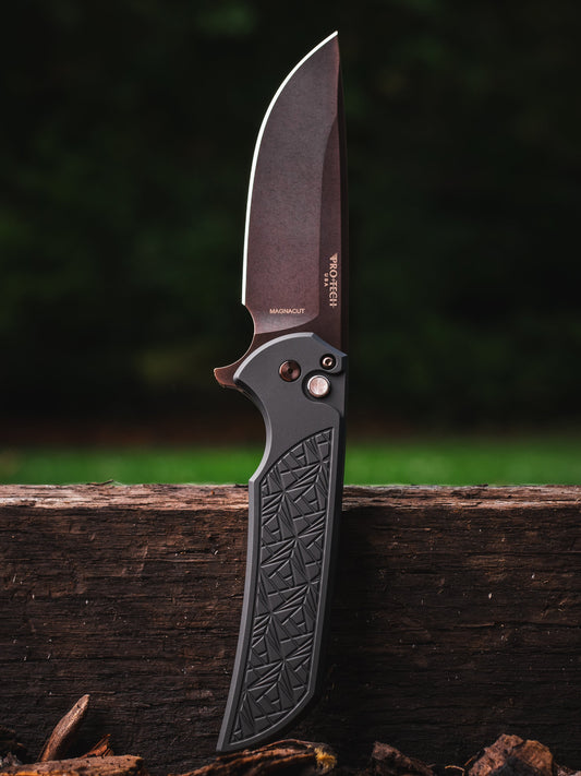 Pro-Tech Mordax CCKSF26.Mordax.1 front view – 3.5" antique PVD MagnaCut drop point button lock flipper, NEXUS textured black handle