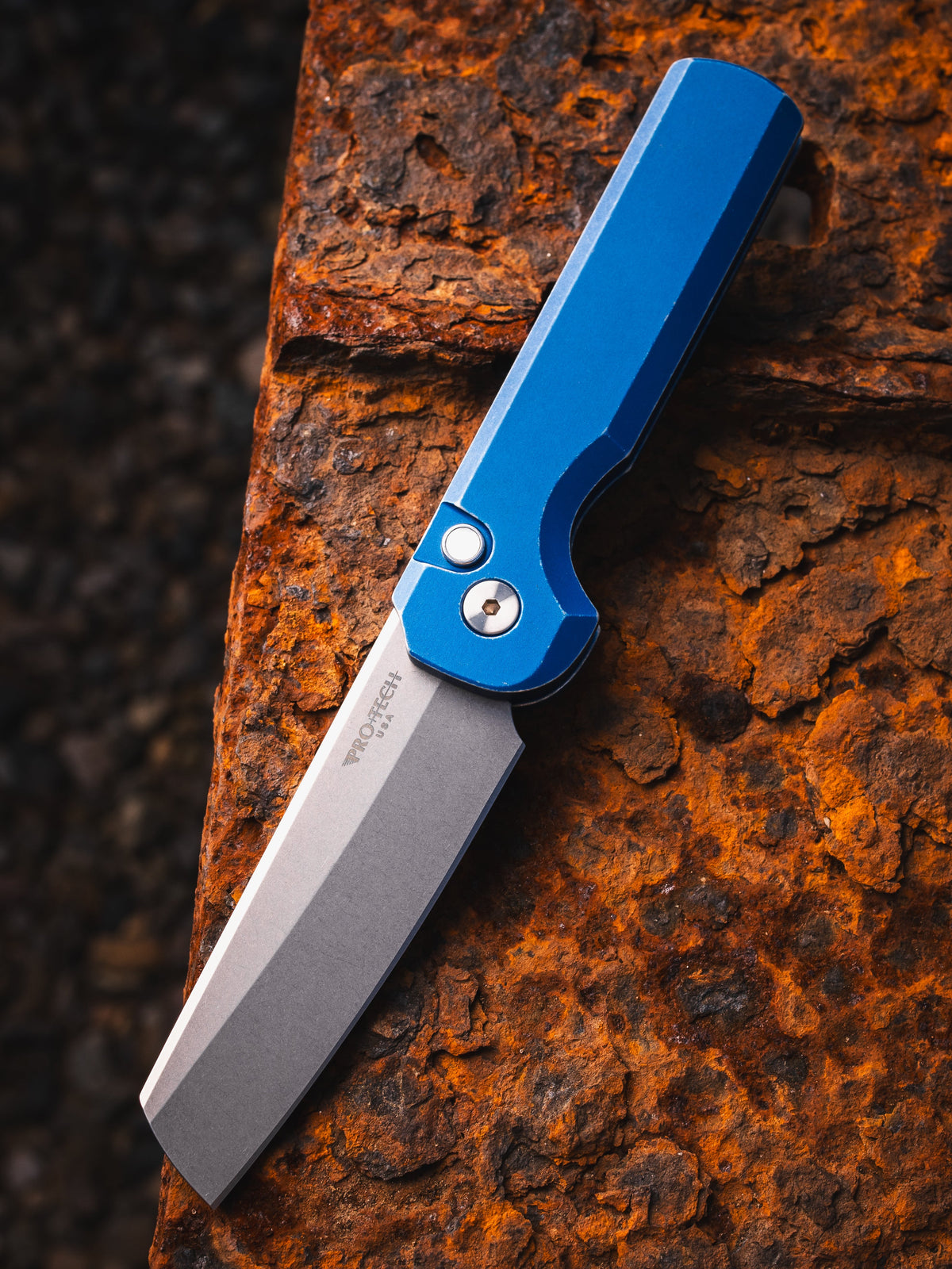 Pro-Tech Slimfoot CCKSF26.Slimfoot.1 front view – battleworn blue automatic knife, closed, CCKS Fall 2026 exclusive