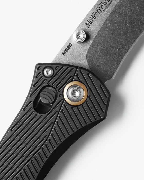 Benchmade Seven | Ten 710‑25 – 4″ M390 Satin Drop‑Point/Recurve Blade, Black Aluminum, AXIS Lock