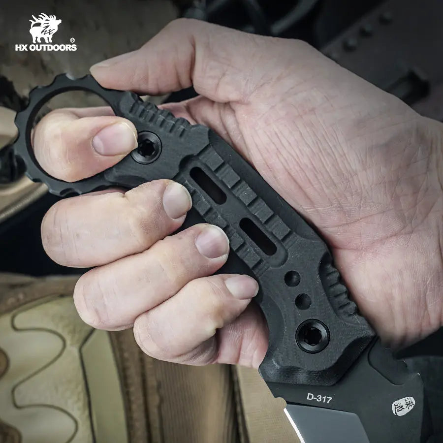 HX Outdoors Shadowfang Claw D-317 black G10 handle and safety ring detail