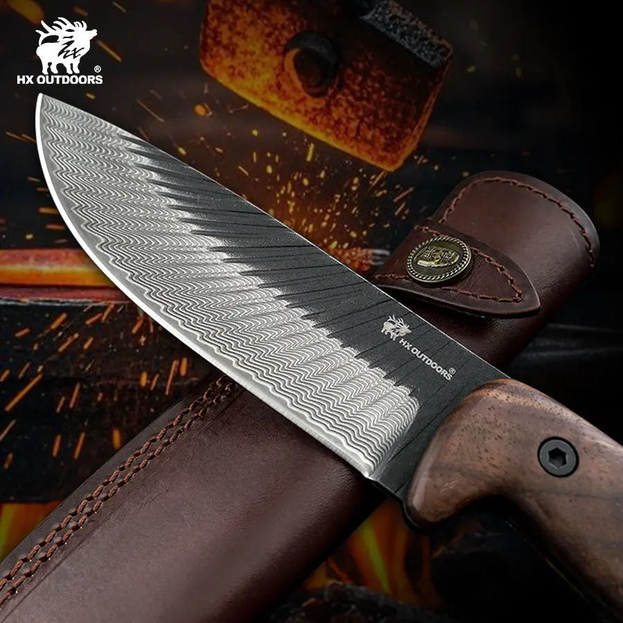 HX Outdoors Junglord D-340 blade detail – 79-layer forged 90Cr18MoV drop point