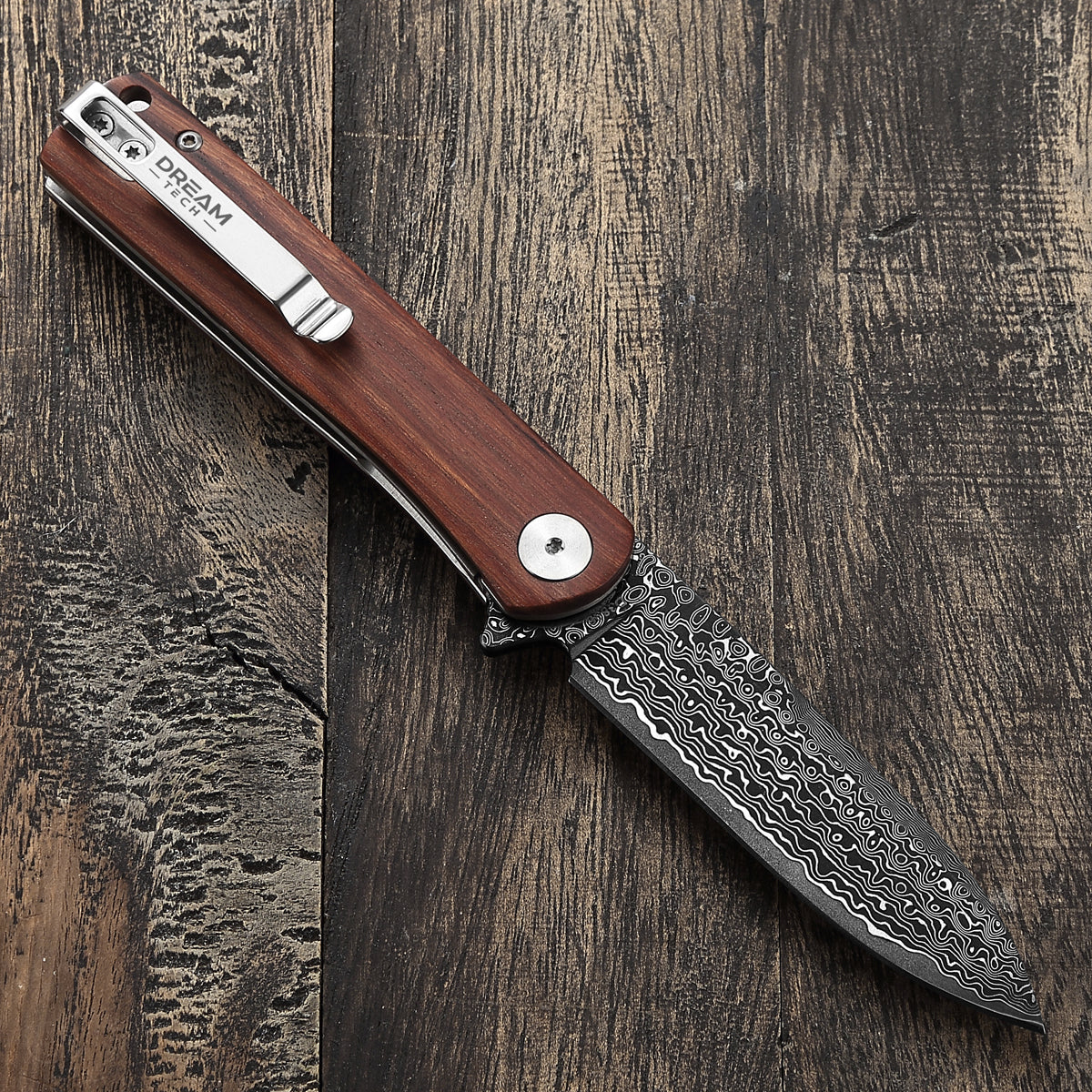 DreamTech D3896WD Damascus folding knife, further view of the 3.27″ drop point blade and wood handle