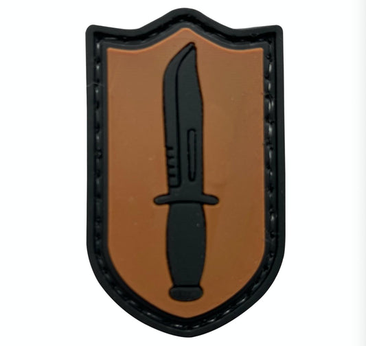 Dagger Shield Morale Patch DG-BR front view – 1.18″ x 1.97″ brown shield with black dagger 3D PVC patch