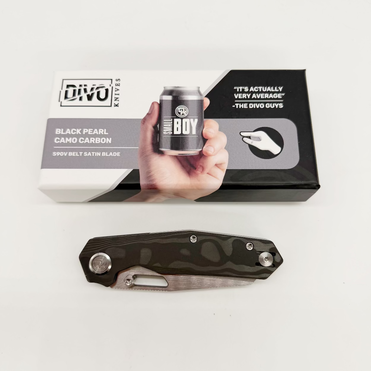Divo Knives Small Boy Black Pearl Camo Carbon retail box with the closed carbon fiber folding knife