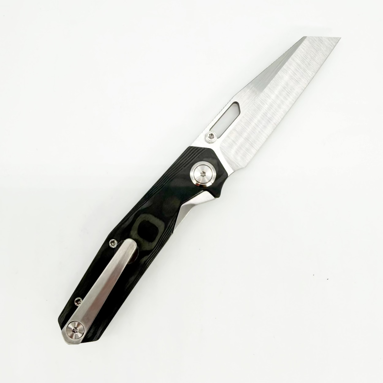 Divo Knives Small Boy clip side, showing the steel tip-up pocket clip and Black Pearl camo carbon fiber handle