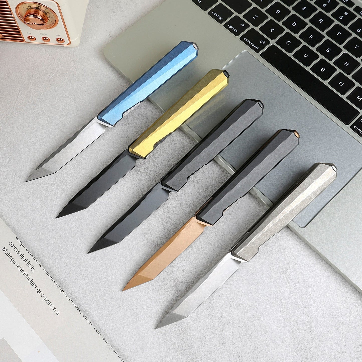 Remette RT-ELIGO EGA2 open position showing bronze M390 tanto blade