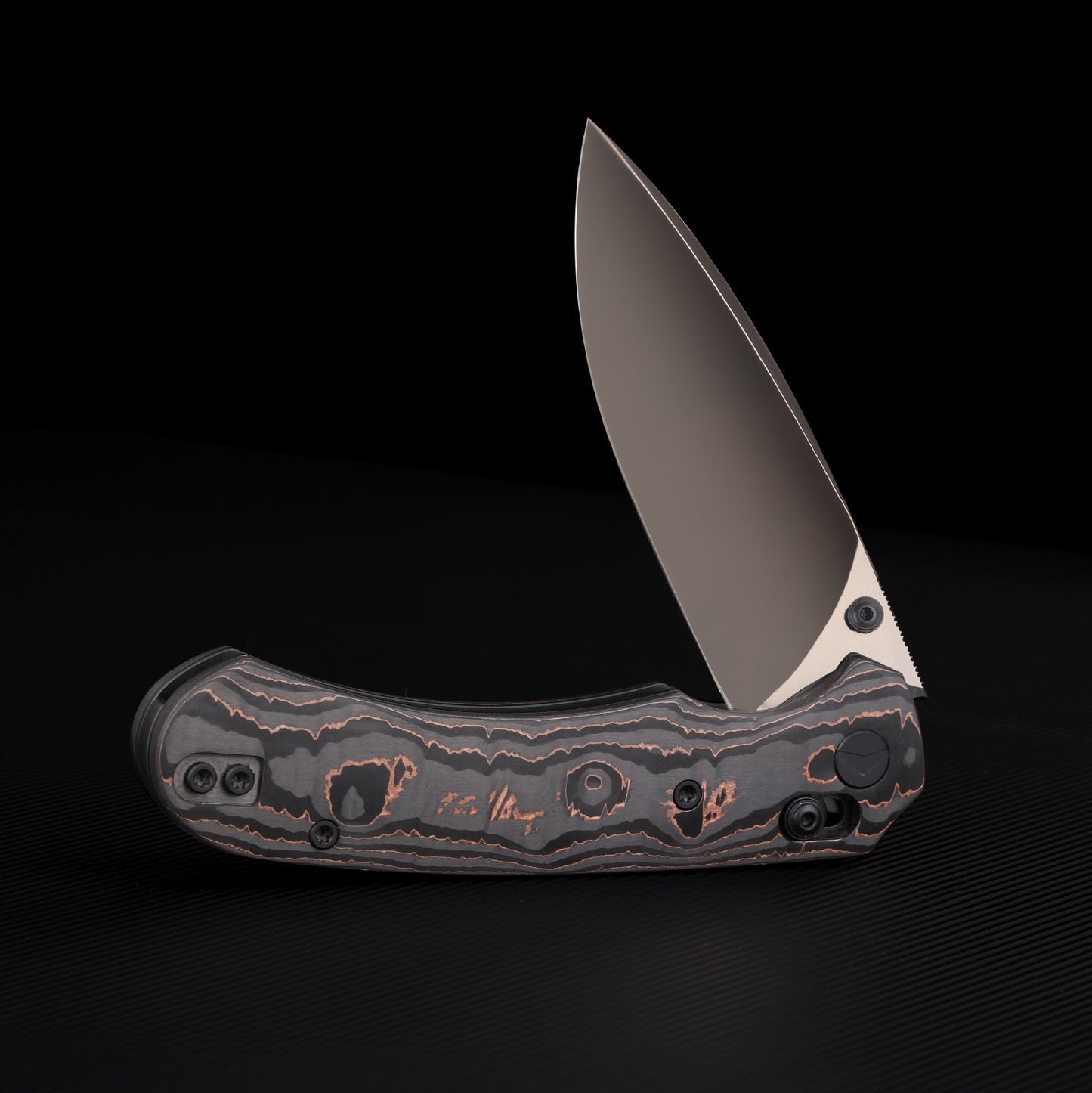 FerraMonster Spectrum FM23004-D – 3.31" Black DLC M390 Blade, Copper Foil Carbon Fiber Crossbar Lock Knife