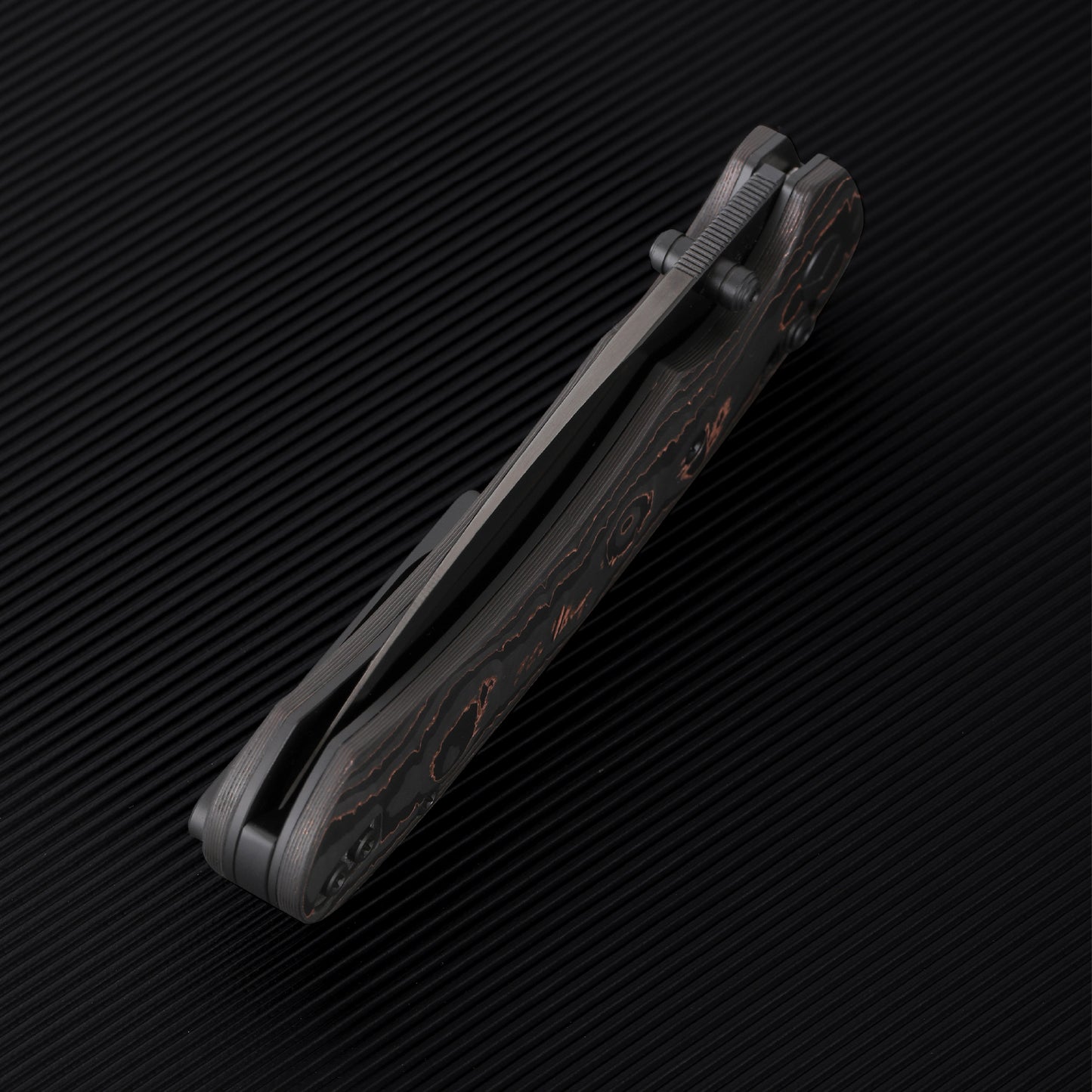 FerraMonster Spectrum FM23004-D – 3.31" Black DLC M390 Blade, Copper Foil Carbon Fiber Crossbar Lock Knife