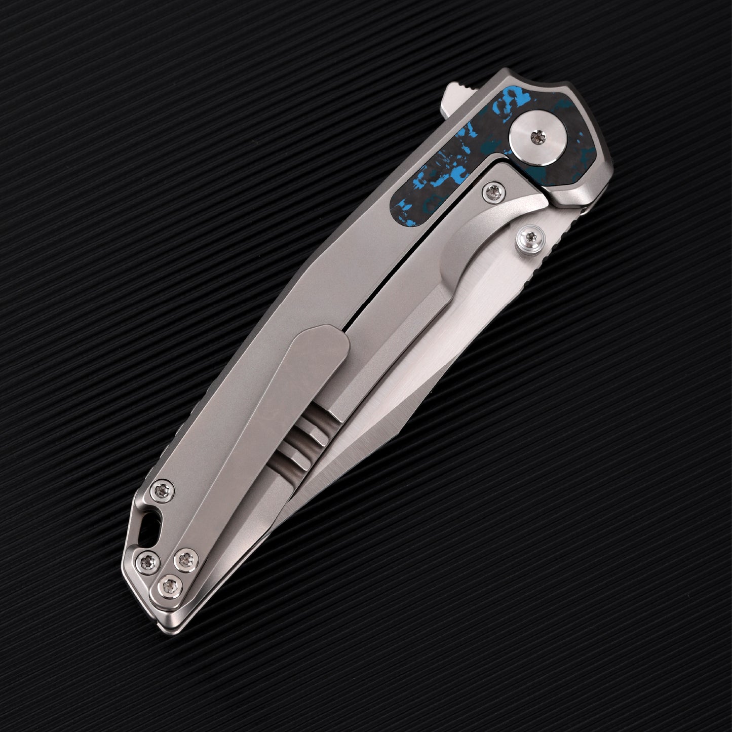 FerraMonster Valken FM23005-B – 3.46" M390 Belt Satin Clip Point Blade, Titanium Frame Lock with Arctic Storm FatCarbon Inlay