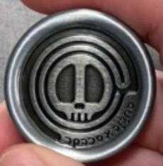 Skull Coin EDC Push Slider GG-SLIDER-COIN front view – 1.46″ round silver skull fidget slider