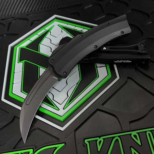 Heretic Knives ROC Auto OTF H060-6A-T front view – 3.18″ DLC CPM MagnaCut hawkbill automatic knife